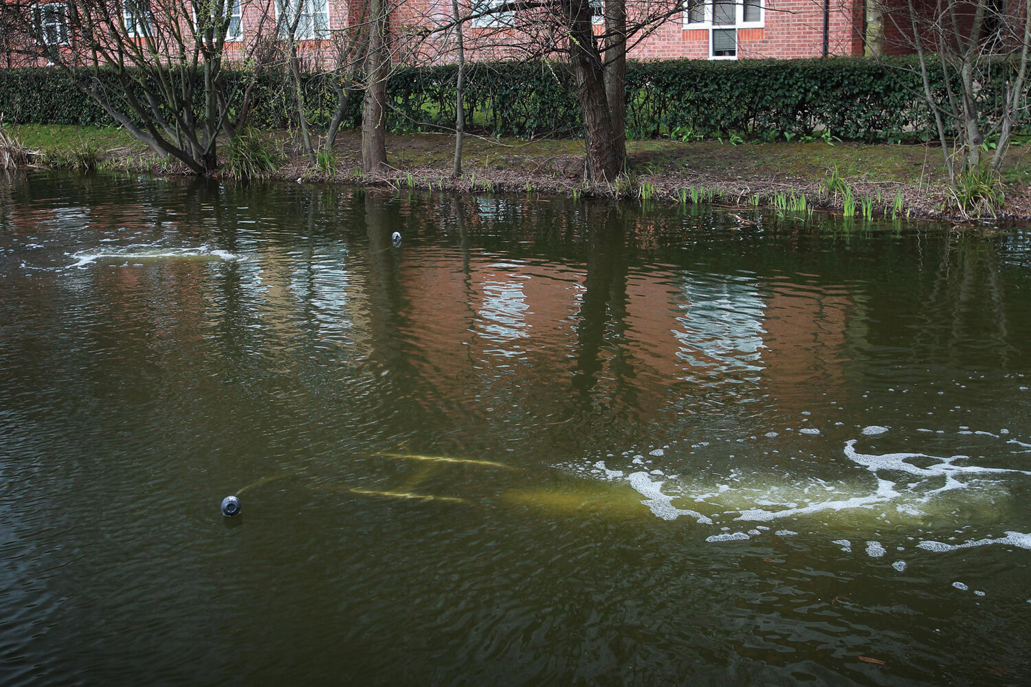 One of Otterbine's Sunburst Aerating Fountains in a beautiful park